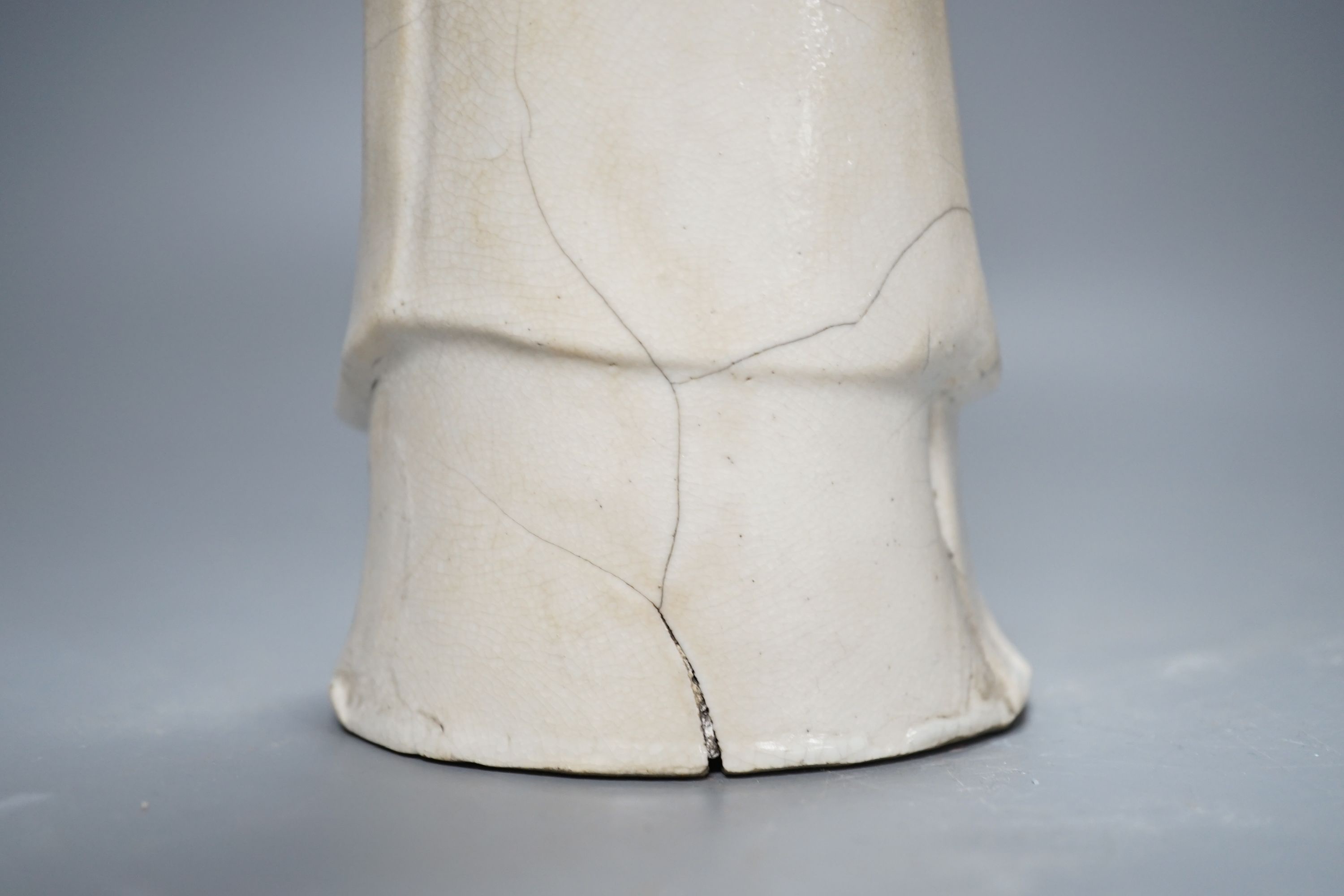 A Chinese blanc de chin figure of a lady with a bird, 37cm, together with a famille rose teapot, a yixing style teapot, blue and white jar and cover and a pale celadon ground ‘ox head’ libation cup